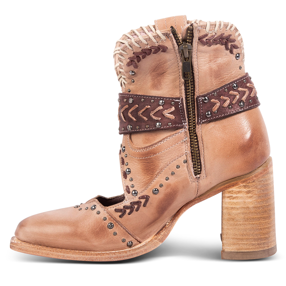 Inside view showing working brass zip closure, western detailing and a wood stacked heel on FREEBIRD women's Jetson blush bootie