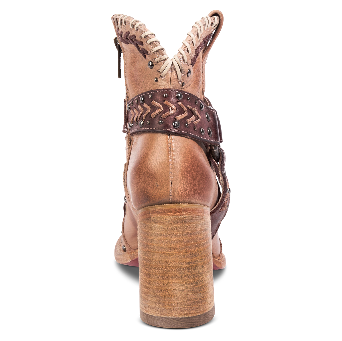 Back view showing a wood stacked heel and detailed heel strap on FREEBIRD women's Jetson blush bootie