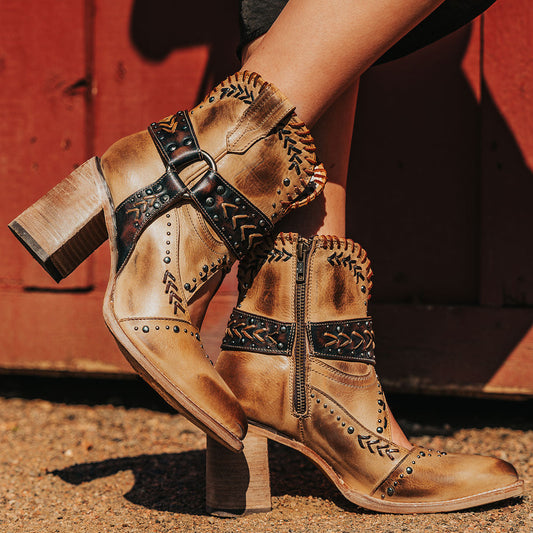 FREEBIRD women's Jetson tan western heeled bootie with vintage-inspired detailing and instep cutout