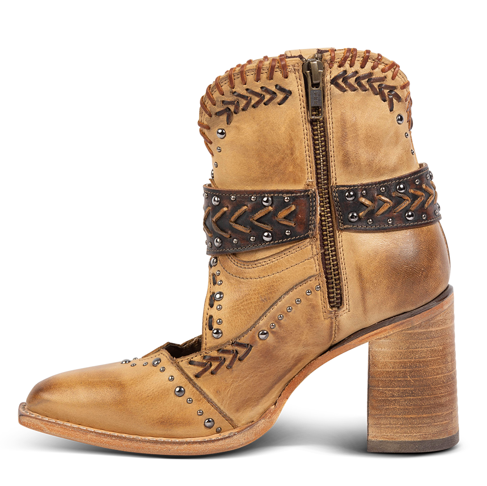 Inside view showing working brass zip closure, western detailing and a wood stacked heel on FREEBIRD women's Jetson tan bootie