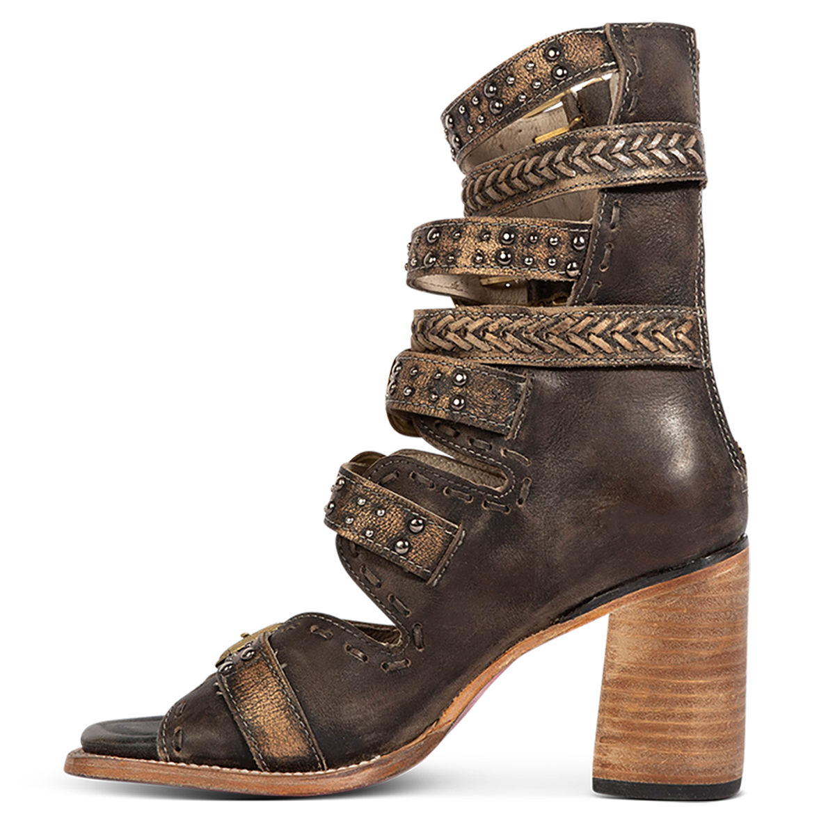 Inside view showing FREEBIRD women's Jett black leather sandal with a high lifted heel, metallic chevron stitching and an open silhouette
