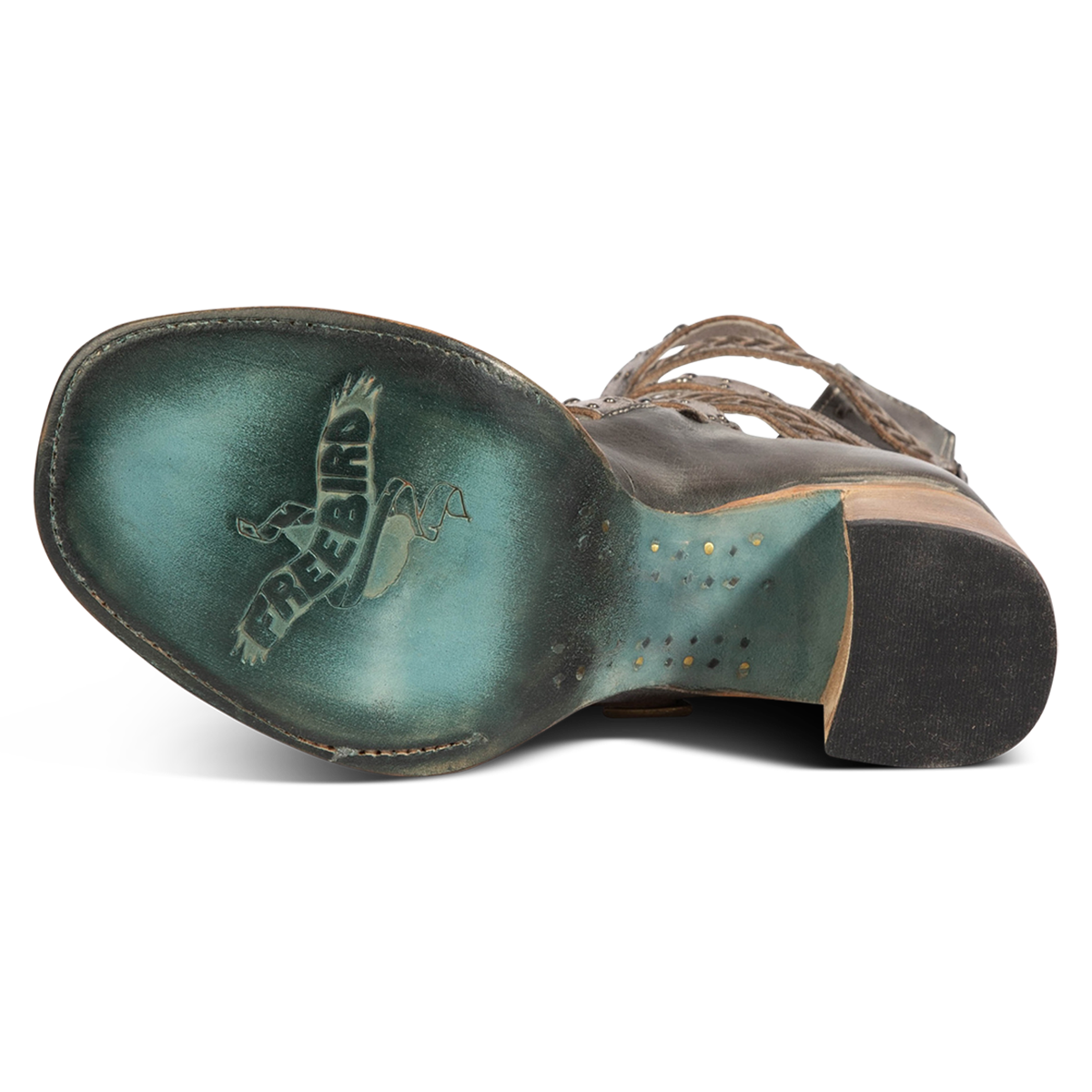 Leather sole imprinted with FREEBIRD on women's Jett blue leather sandal