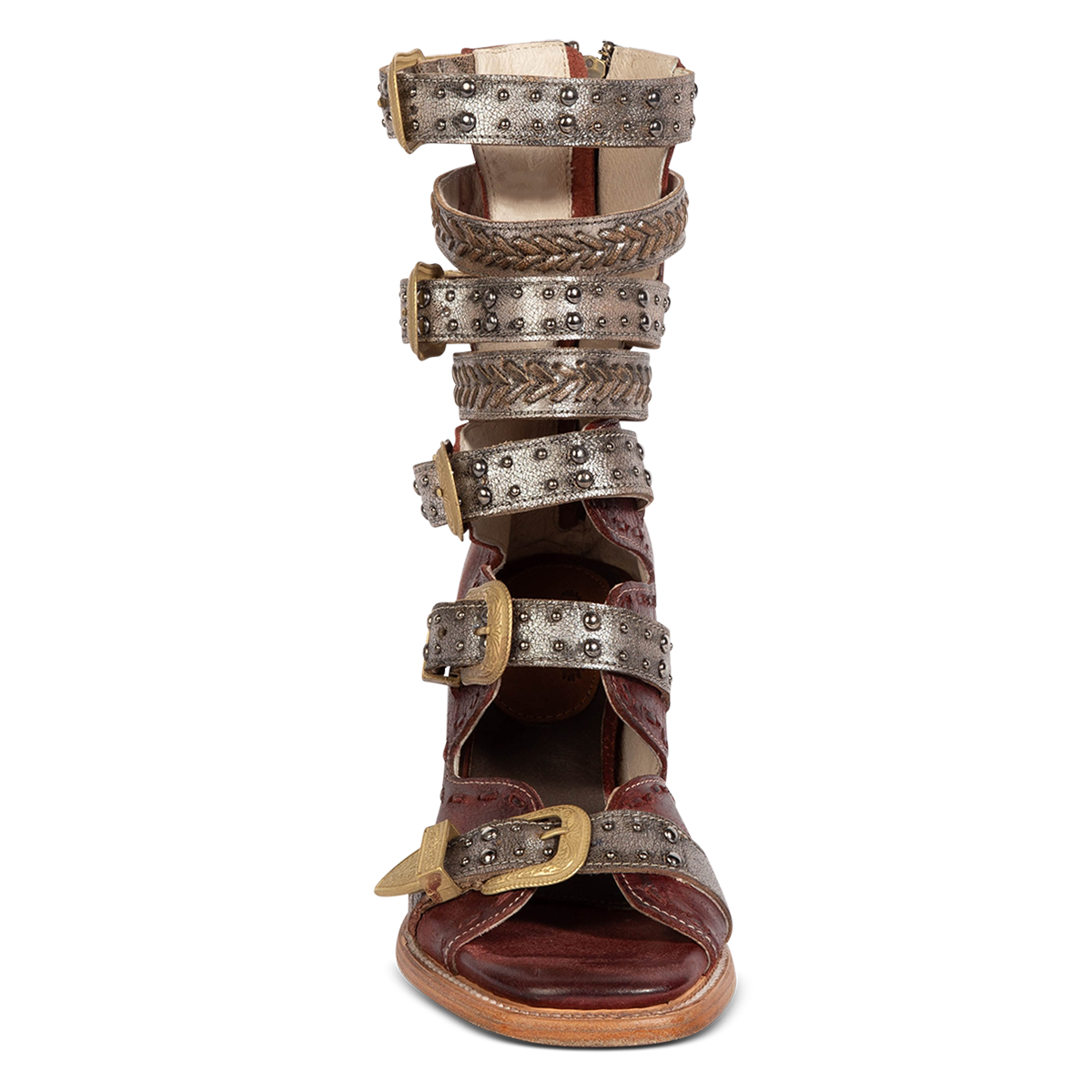Front view showing FREEBIRD women's Jett red leather sandal with adjustable gold buckling, open shaft silhouette and metallic chevron stitching