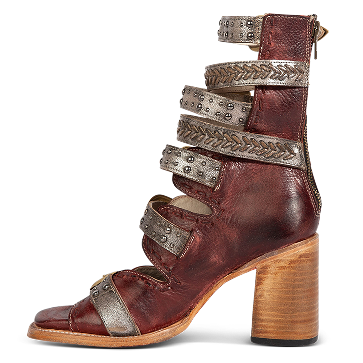 Inside view showing FREEBIRD women's Jett red leather sandal with a high lifted heel, metallic chevron stitching and an open silhouette