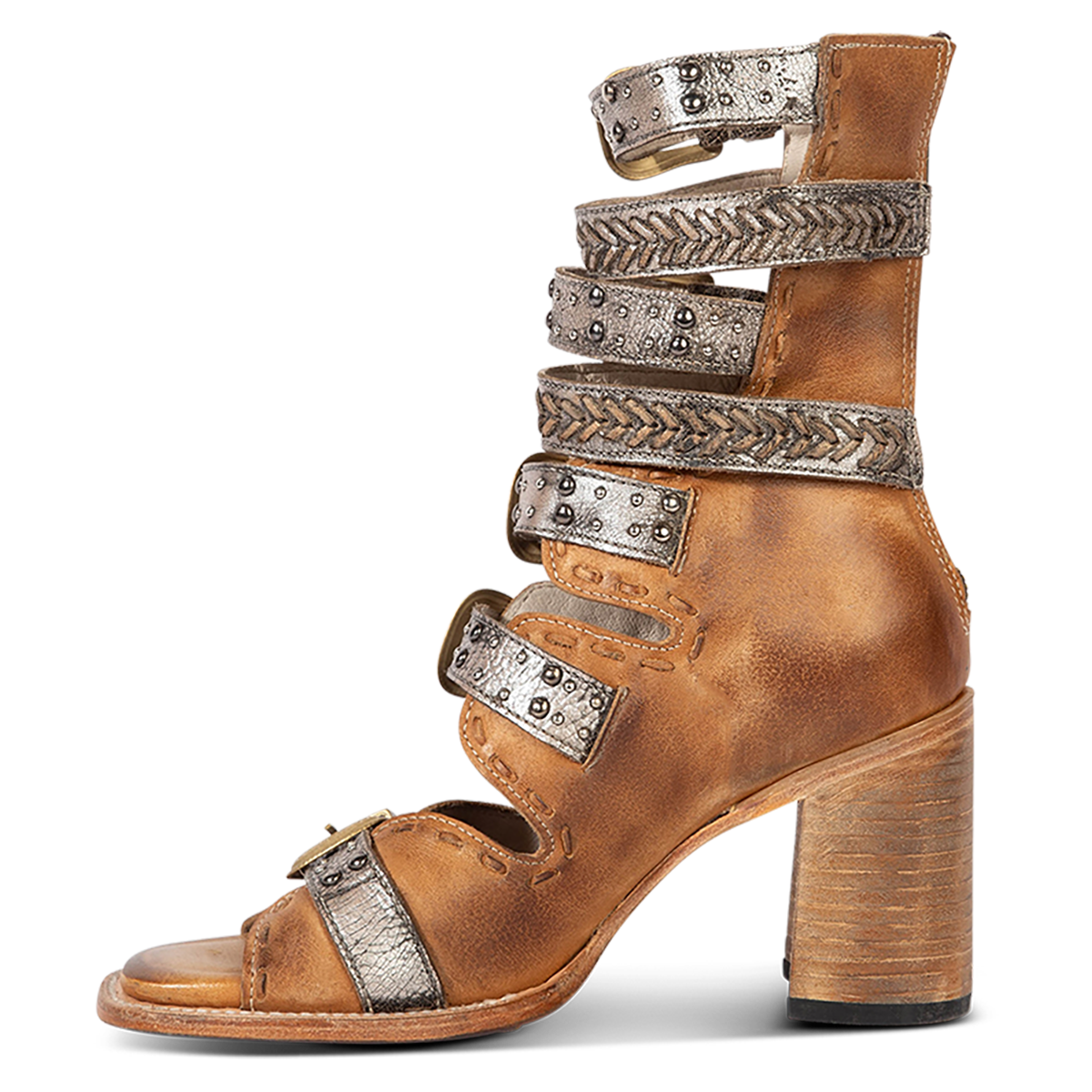 Inside view showing FREEBIRD women's Jett wheat leather sandal with a high lifted heel, metallic chevron stitching and an open silhouette