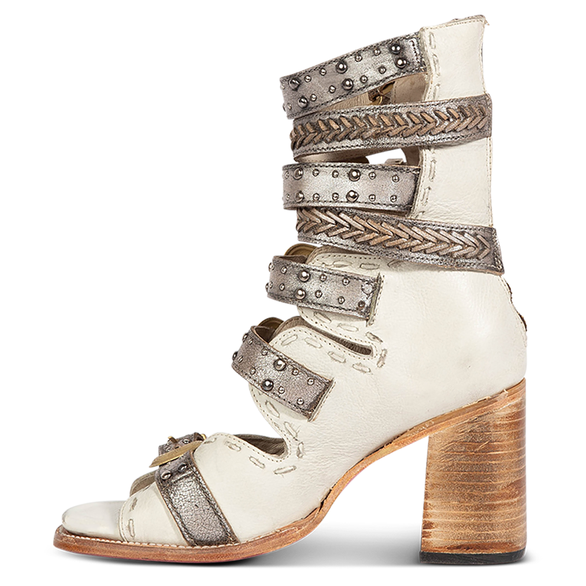 Inside view showing FREEBIRD women's Jett white leather sandal with a high lifted heel, metallic chevron stitching and an open silhouette