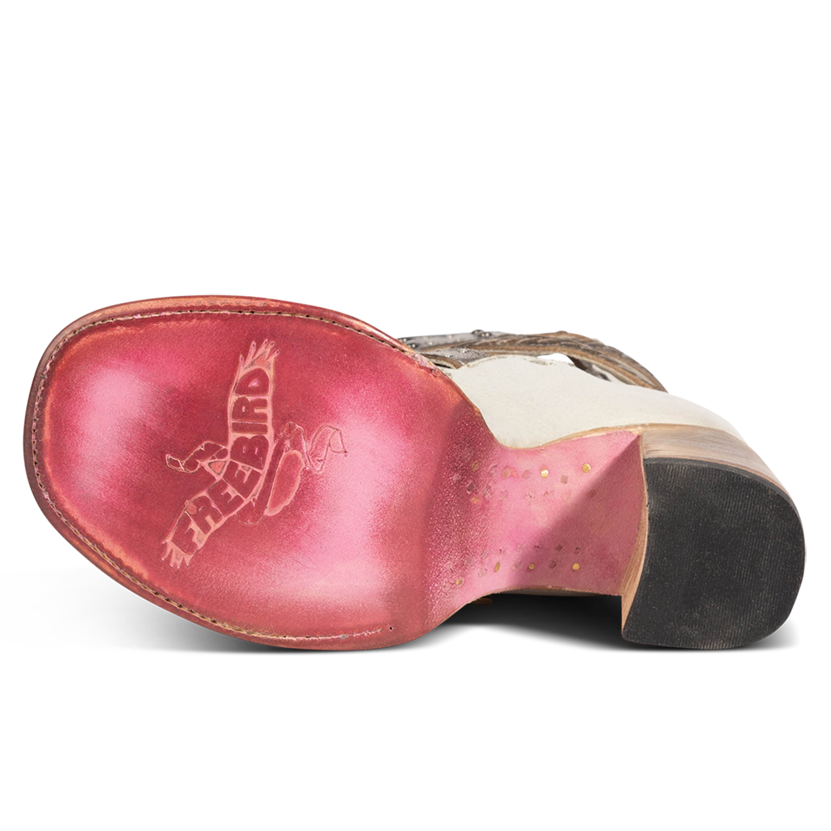 Leather sole imprinted with FREEBIRD on women's Jett white leather sandal