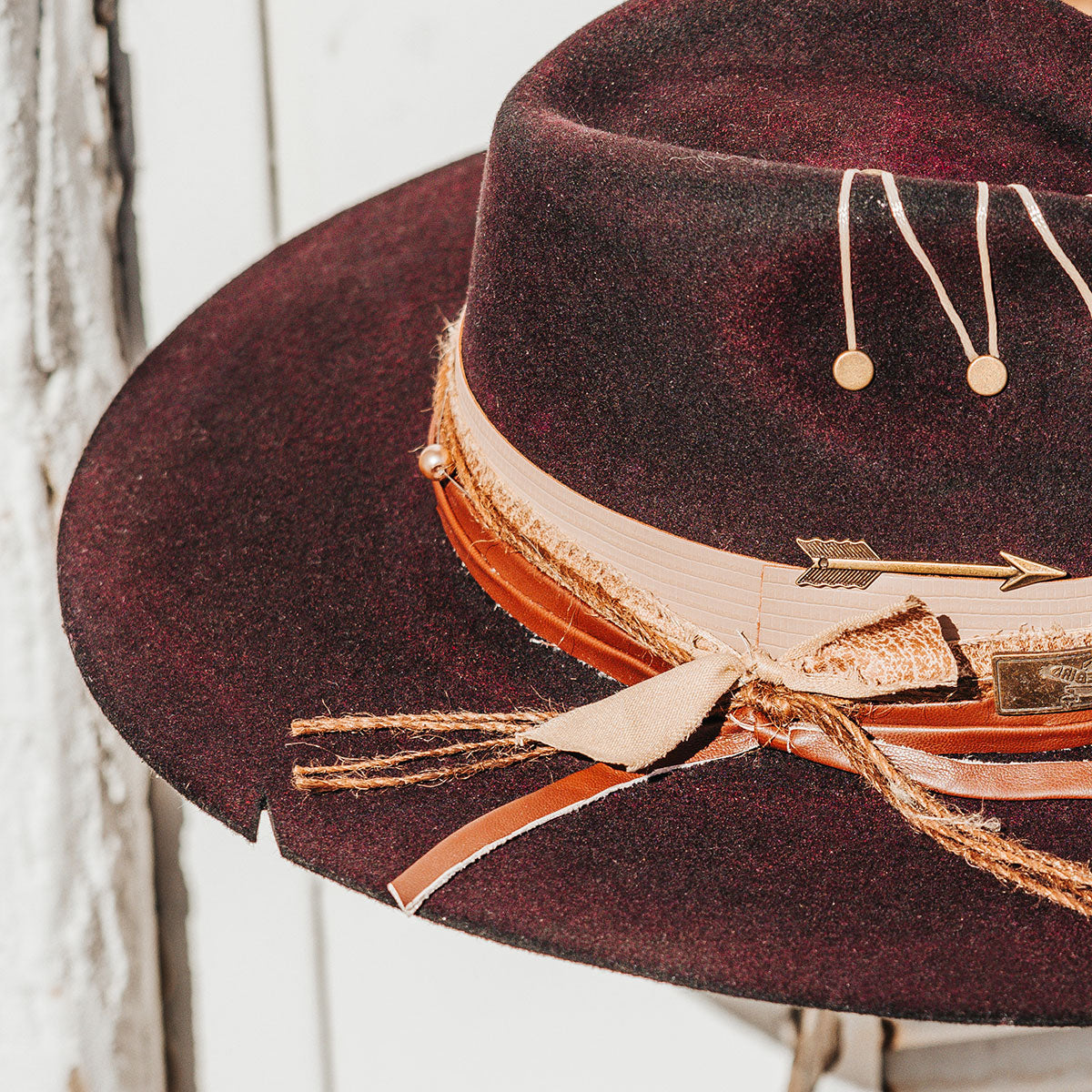 FREEBIRD Jonny purple wool hat with a flat brim construction, tear pinch crown and brim decor