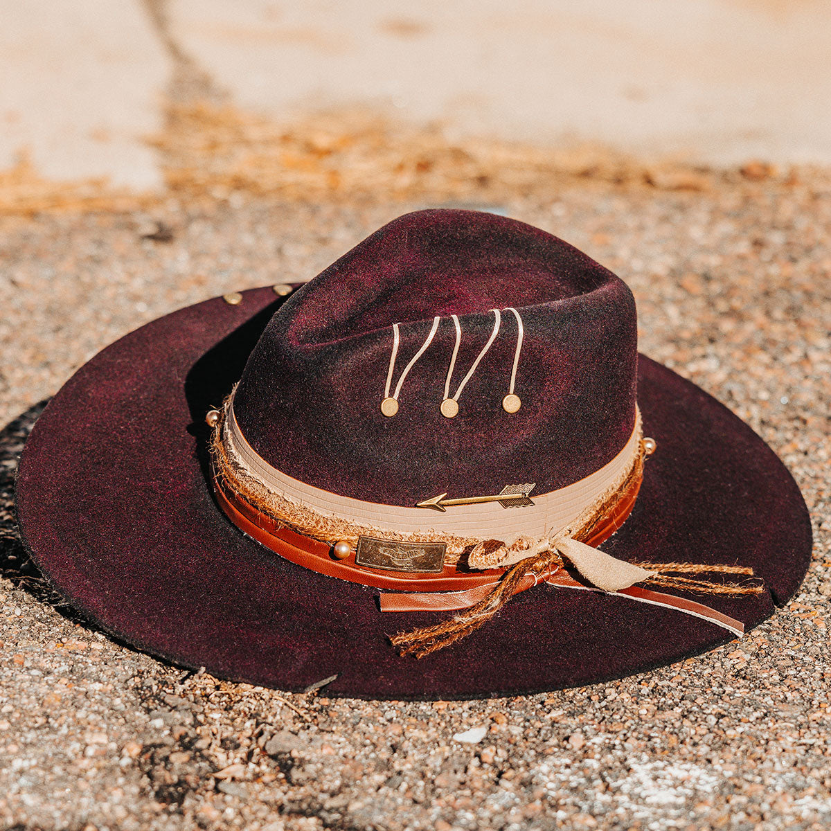 FREEBIRD Jonny purple wool hat with a flat brim construction, tear pinch crown and brim decor
