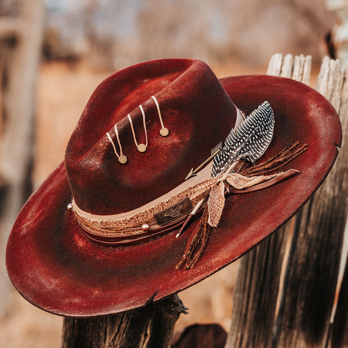 FREEBIRD Jonny red wool hat with a flat brim construction, tear pinch crown and brim decor