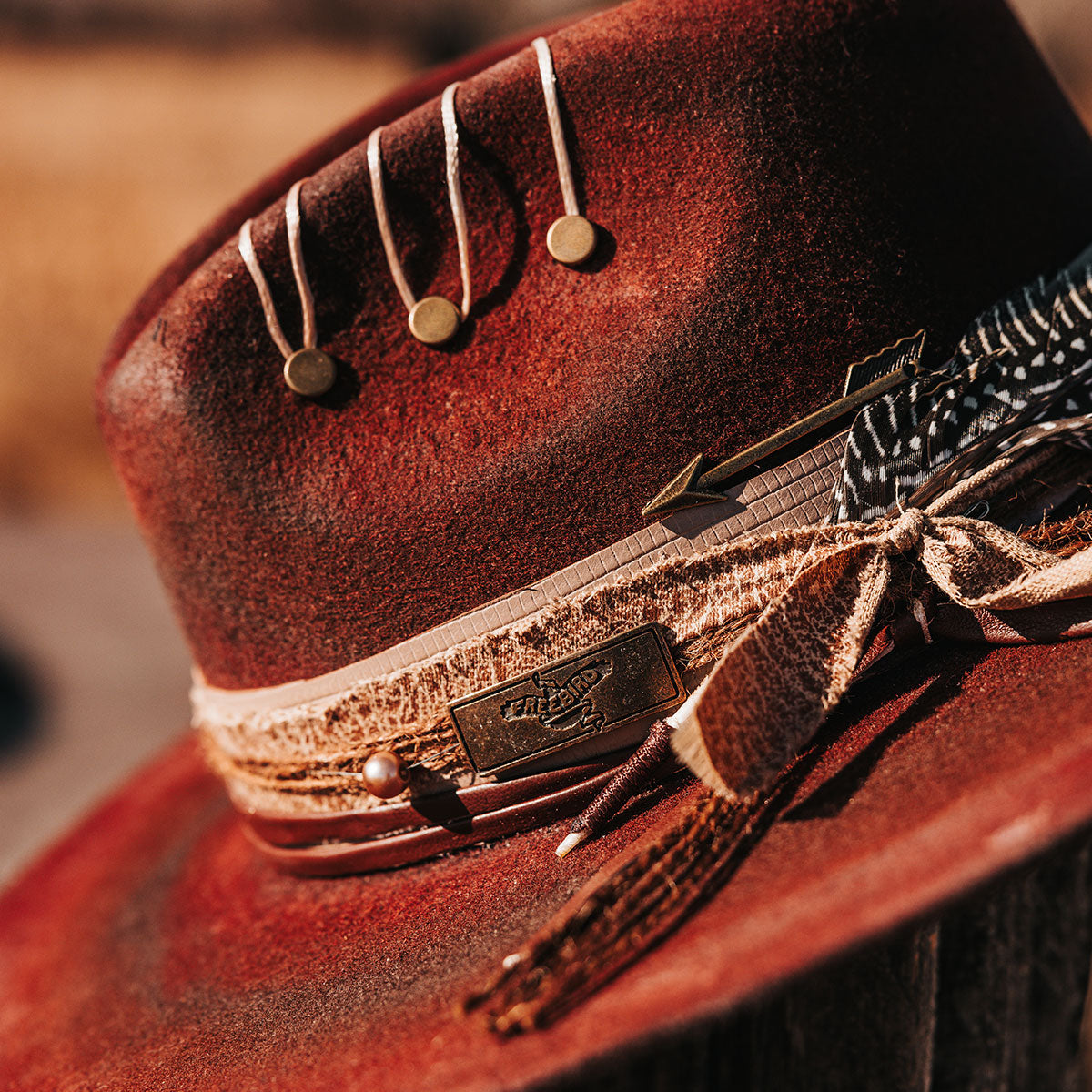 FREEBIRD Jonny red wool hat with a flat brim construction, tear pinch crown and brim decor