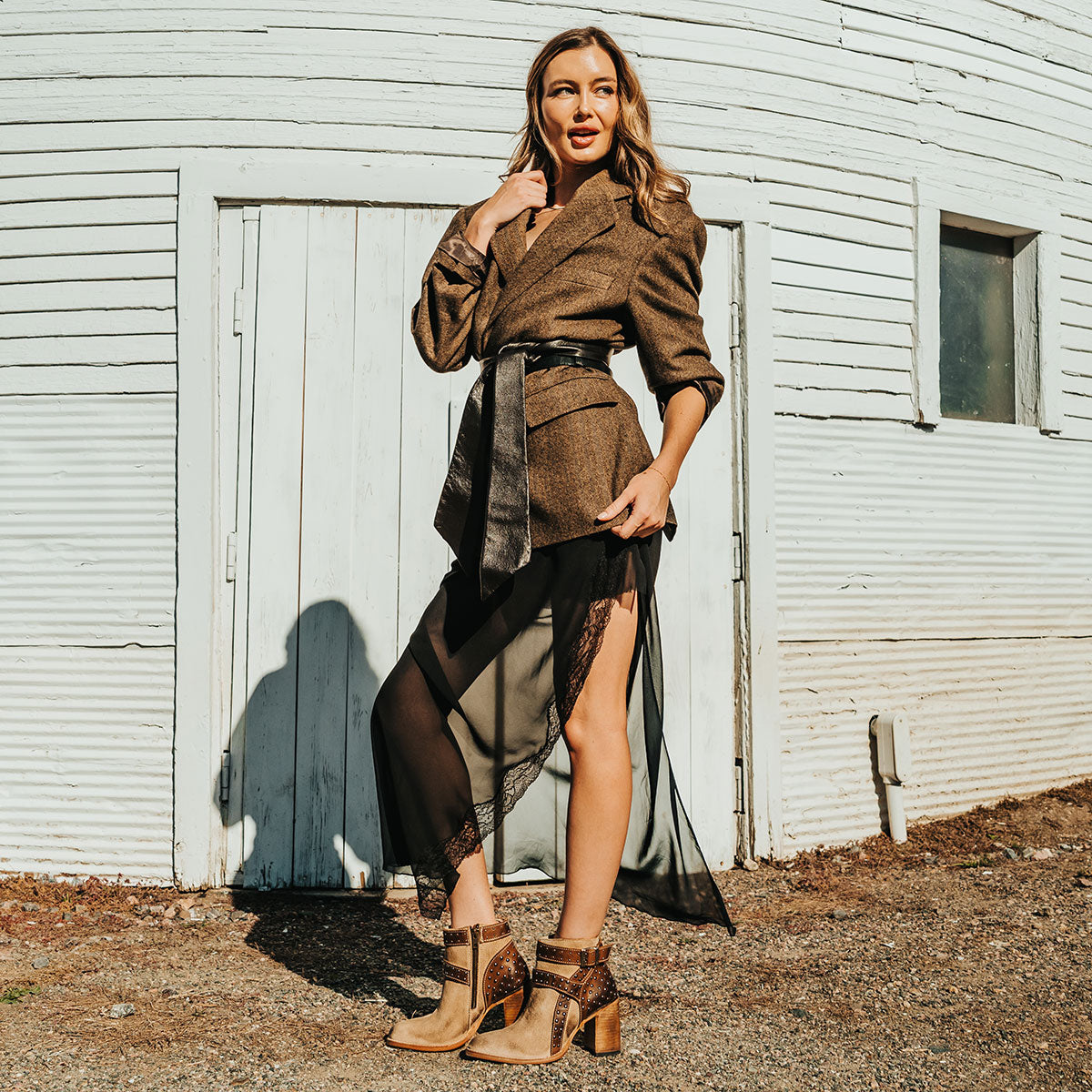 FREEBIRD women's Jovi beige suede bootie with inside zip closure, flare heel, and stud detailing lifestyle image