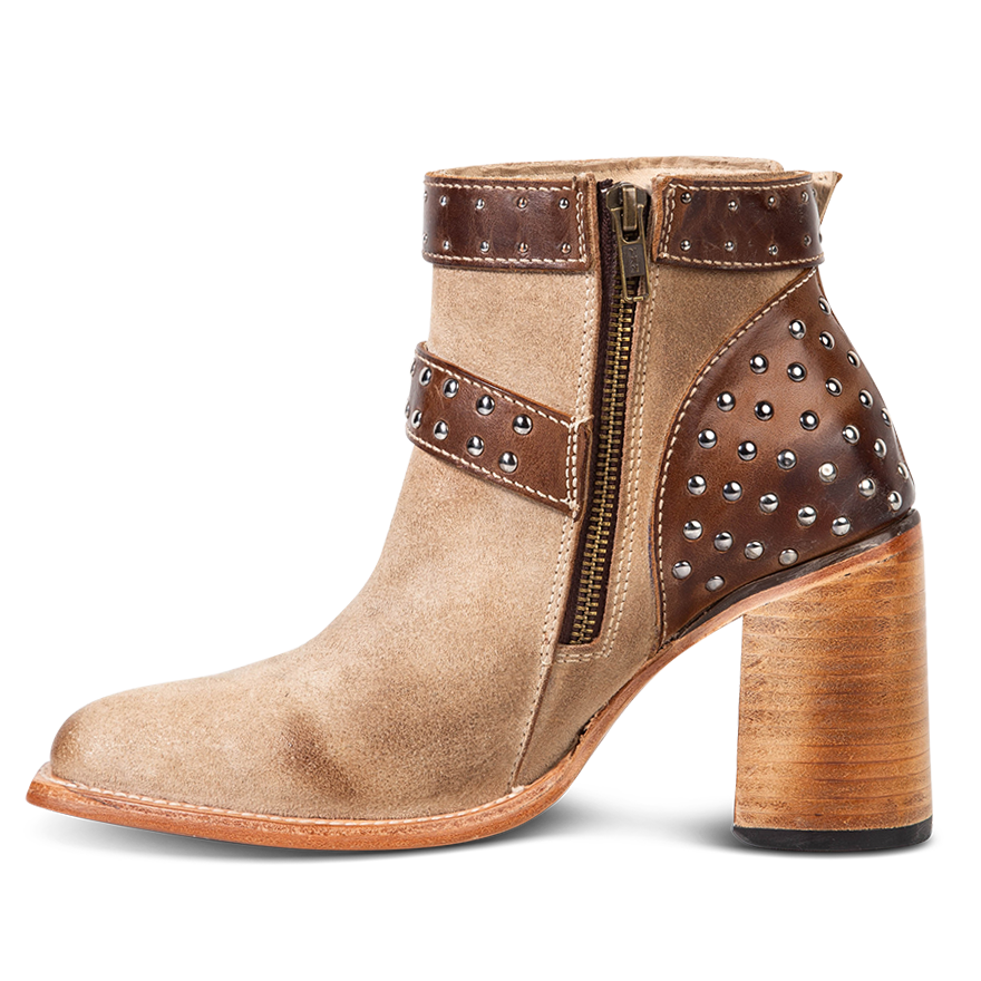 Inside view showing working brass zip closure and contrasting leather detailing on FREEBIRD women's Jovi beige suede bootie