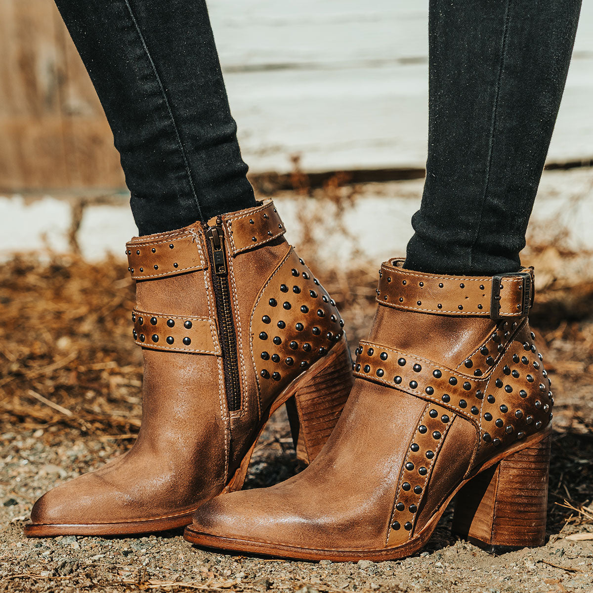 FREEBIRD women's Jovi cognac suede bootie with inside zip closure, flare heel, and stud detailing 