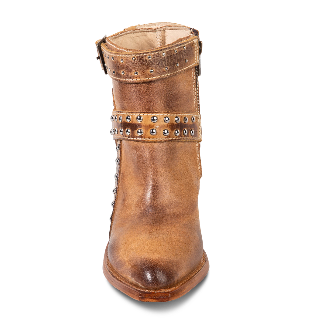 Front view showing contrasting solid leather straps with silver stud detailing on FREEBIRD women's Jovi cognac suede bootie