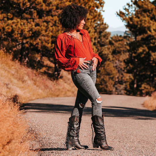 FREEBIRD women's Jules black leather high flare heel western boot with stitch detailing and back lacing lifestyle image