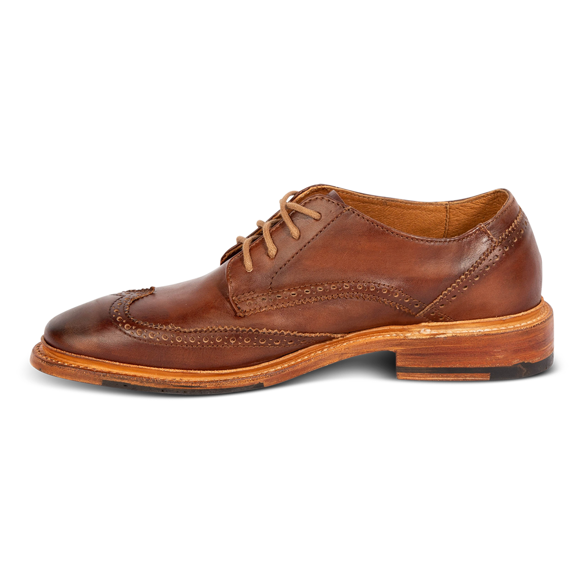 Inside view showing FREEBIRD men's Kensington cognac lace dress shoe with an wingtip toe on a low heel
