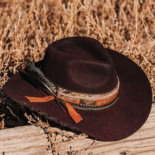 FREEBIRD Kit wool purple hat with a curved brim, pinched teardrop crown and decorated brim