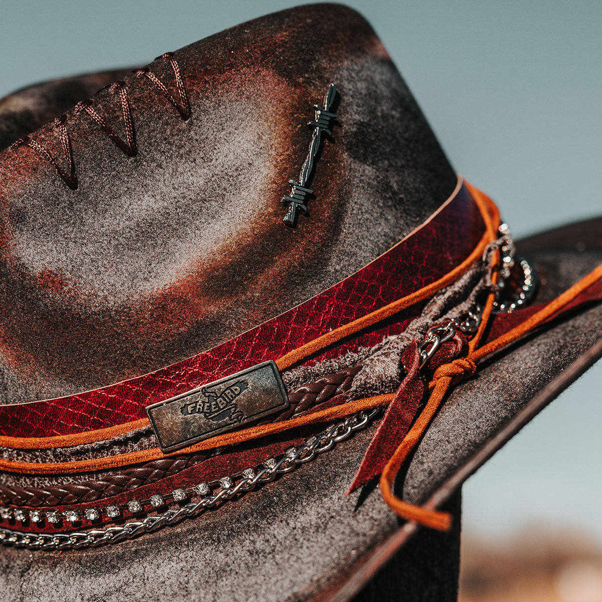 FREEBIRD Knox blue wool hat with a curved brim, pinch tear drop crown and decorated brim