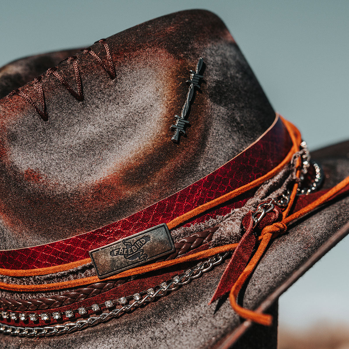 FREEBIRD Knox blue wool hat with a curved brim, pinch tear drop crown and decorated brim