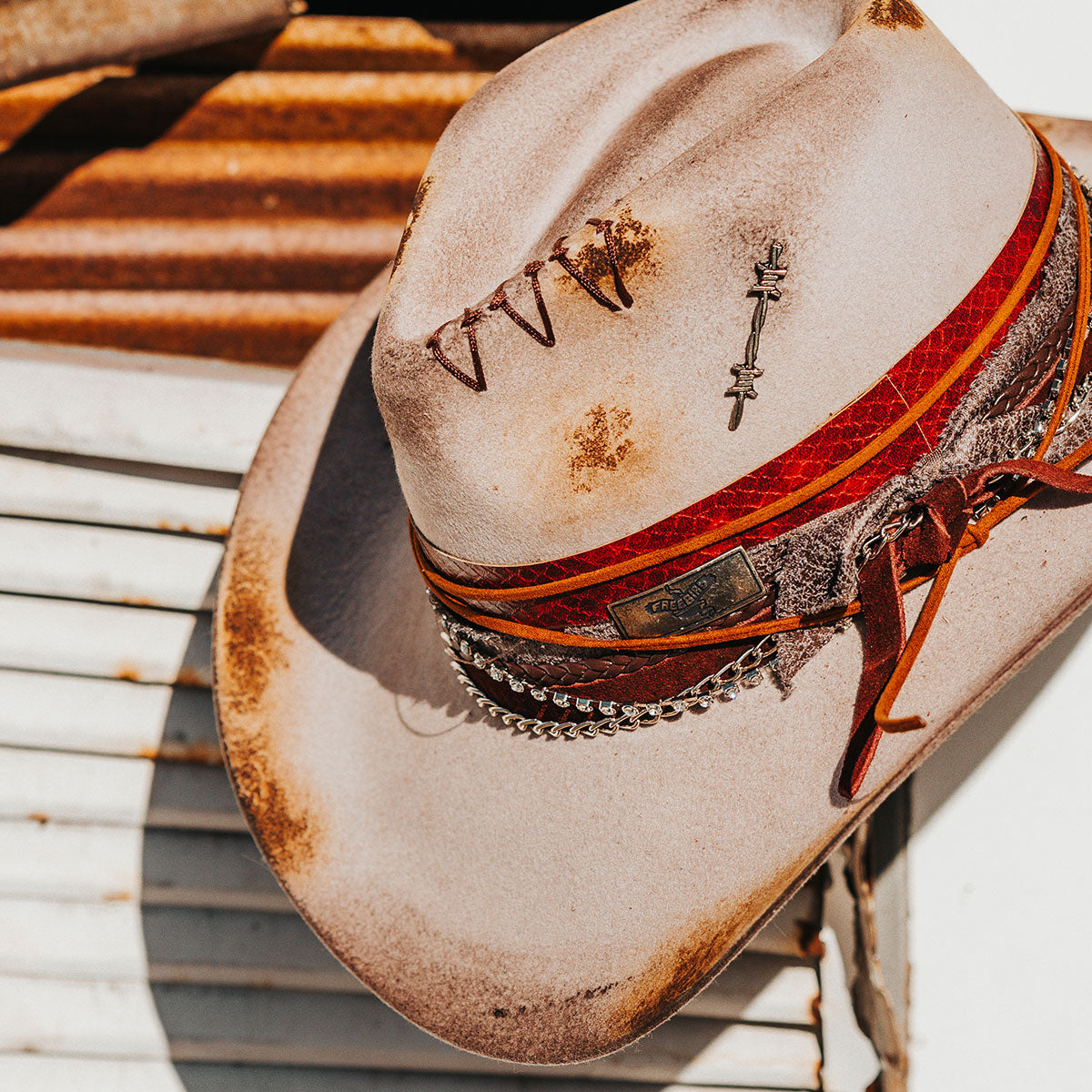 FREEBIRD Knox grey wool hat with a curved brim, pinch tear drop crown and decorated brim