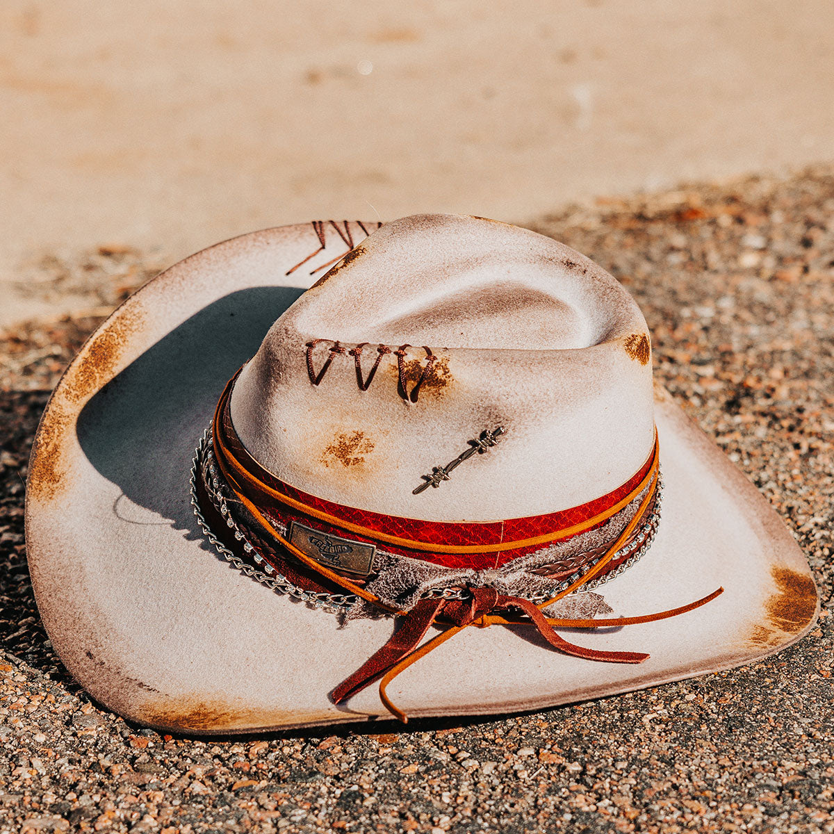 FREEBIRD Knox grey wool hat with a curved brim, pinch tear drop crown and decorated brim