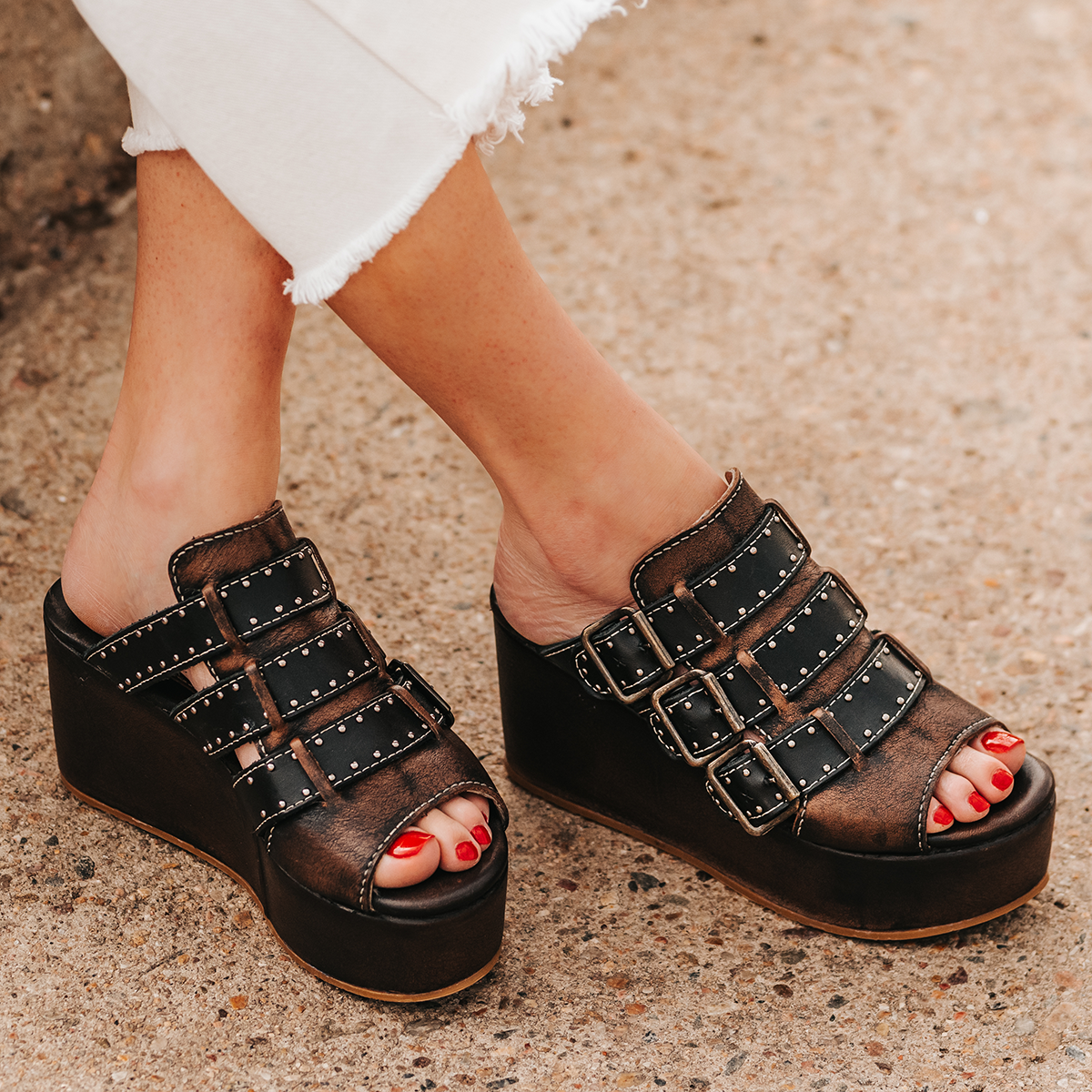 FREEBIRD women's Landi black slip-on sandal with adjustable straps and platform heel
