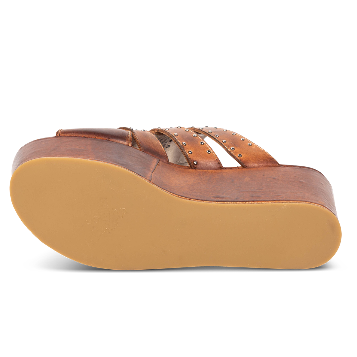 Rubber sole imprinted with FREEBIRD on women's Landi cognac platform sandal