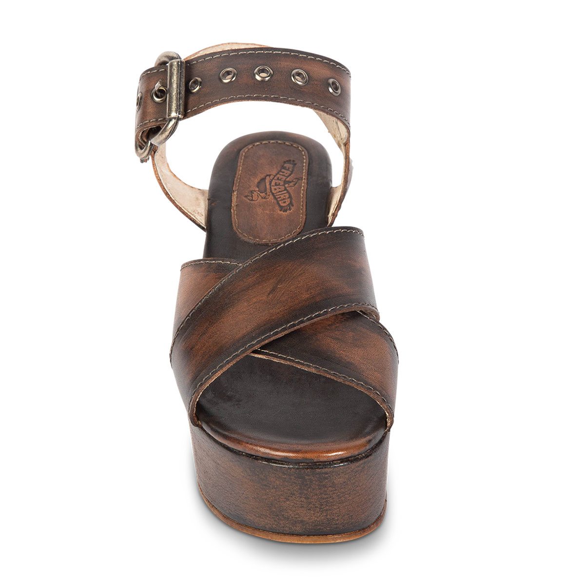 Front view showing cross-over straps on FREEBIRD women's Larae black distressed wedge sandal with platform heel and an adjustable ankle strap