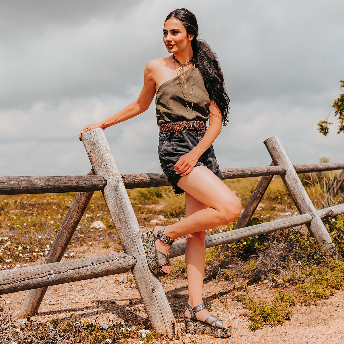 FREEBIRD women's Larae olive snake wedge sandal with platform heel and an adjustable ankle strap lifestyle