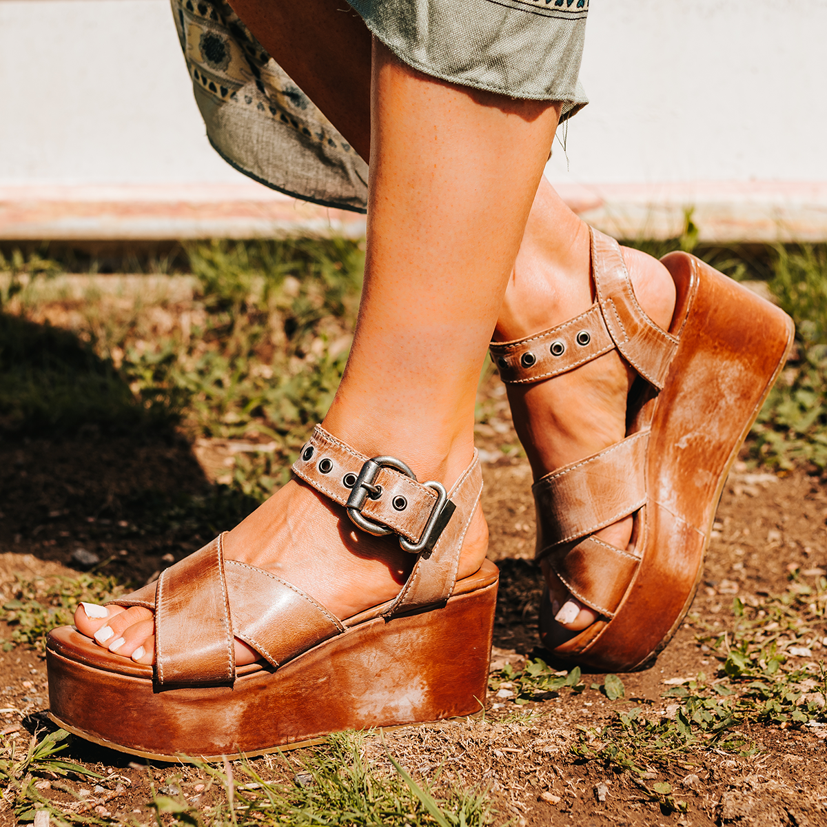 FREEBIRD women's Larae taupe wedge sandal with platform heel and an adjustable ankle strap
