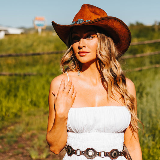 FREEBIRD Lasso rust distressed western hat featuring teardrop crown, upturned-brim, and turquoise metal band