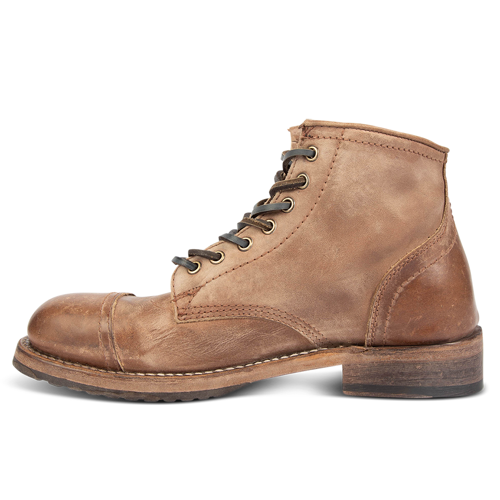 Inside view showing low heel and distressed leather silhouette on FREEBIRD men's Leavenworth brown distressed boot