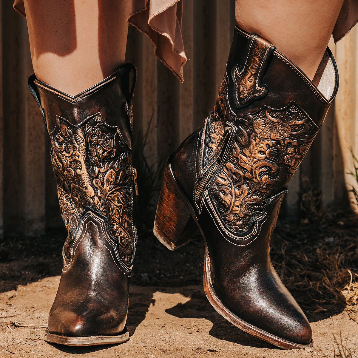 FREEBIRD women's Loretta gold/brown leather boot with a tooled 100% full grain shaft, inside zip closure and inverted heel 