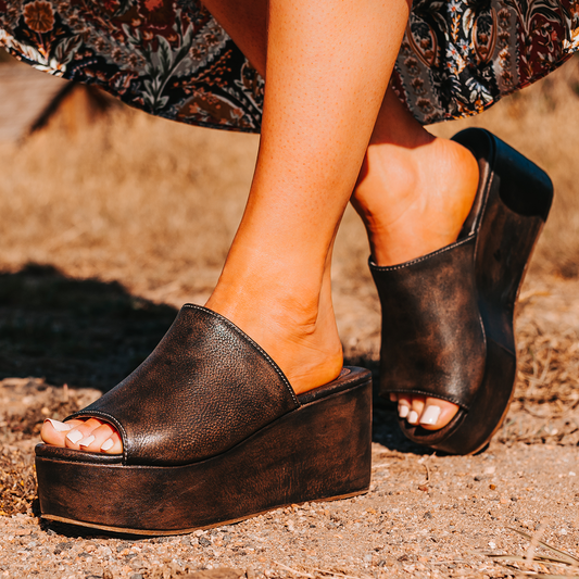 FREEBIRD women's Loveland black slip-on wedge sandal with platform heel