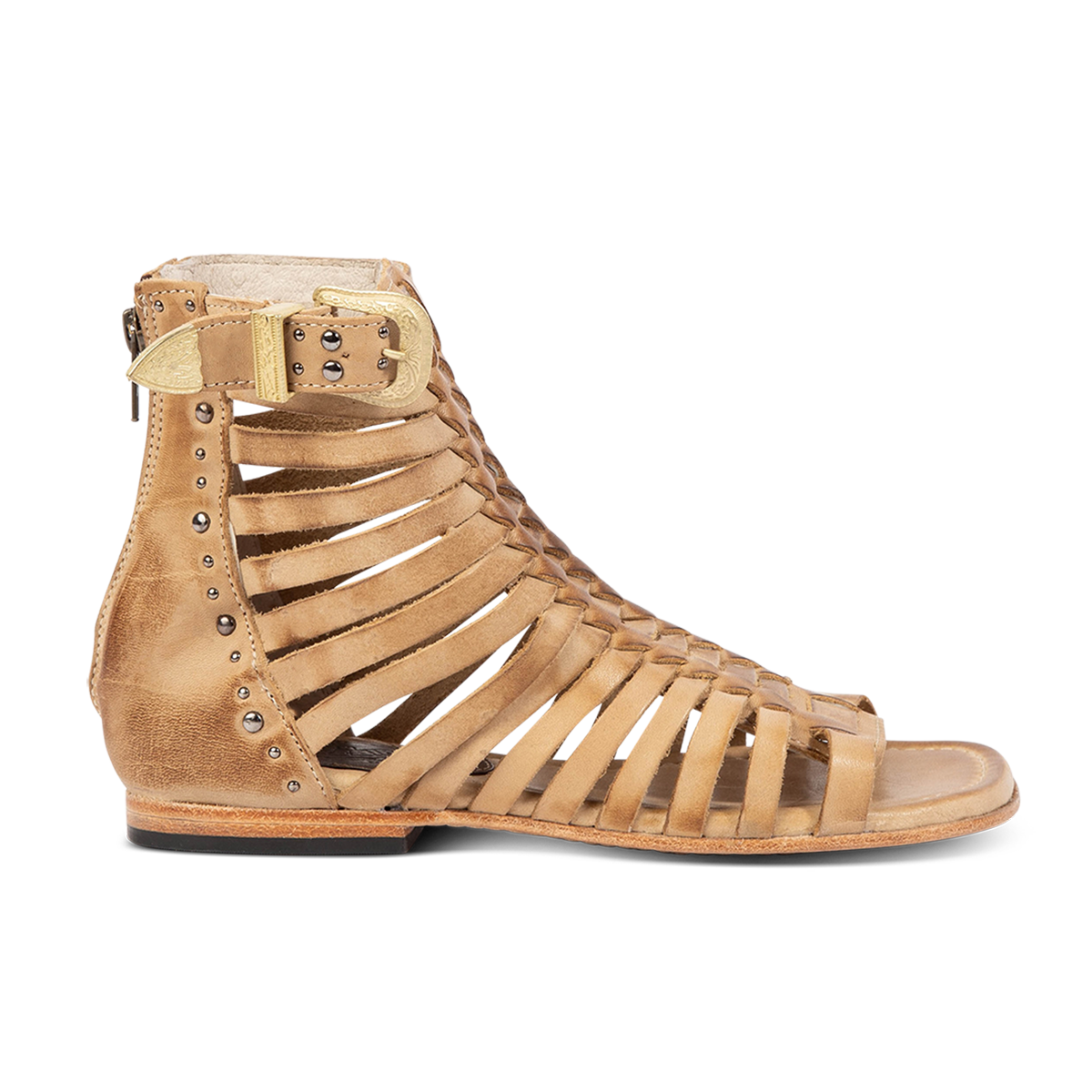 FREEBIRD women's Luna beige leather sandal with a gladiator silhouette, adjustable brass buckle and subtle stud embellishments on a low heel 