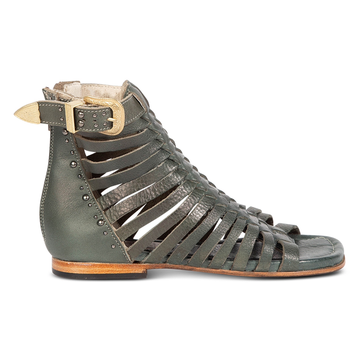 FREEBIRD women's Luna teal leather sandal with a gladiator silhouette, adjustable brass buckle and subtle stud embellishments on a low heel 