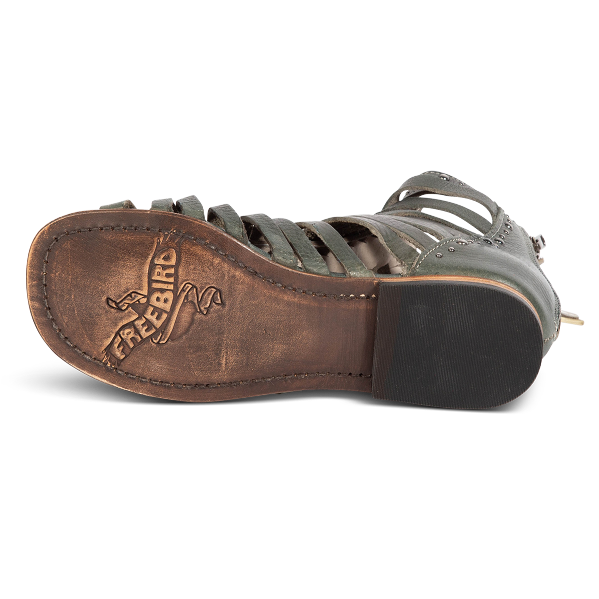 Leather sole imprinted with FREEBIRD on women's Luna teal leather sandal