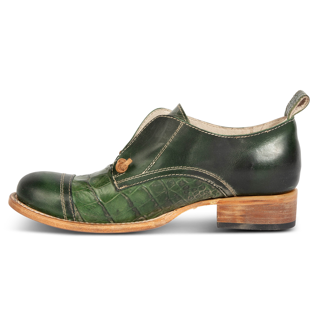 Inside view showing stitch detailing and low heel on FREEBIRD women's Mabel green multi shoe