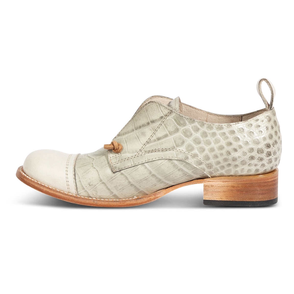 Inside view showing stitch detailing and low heel on FREEBIRD women's Mabel white multi shoe