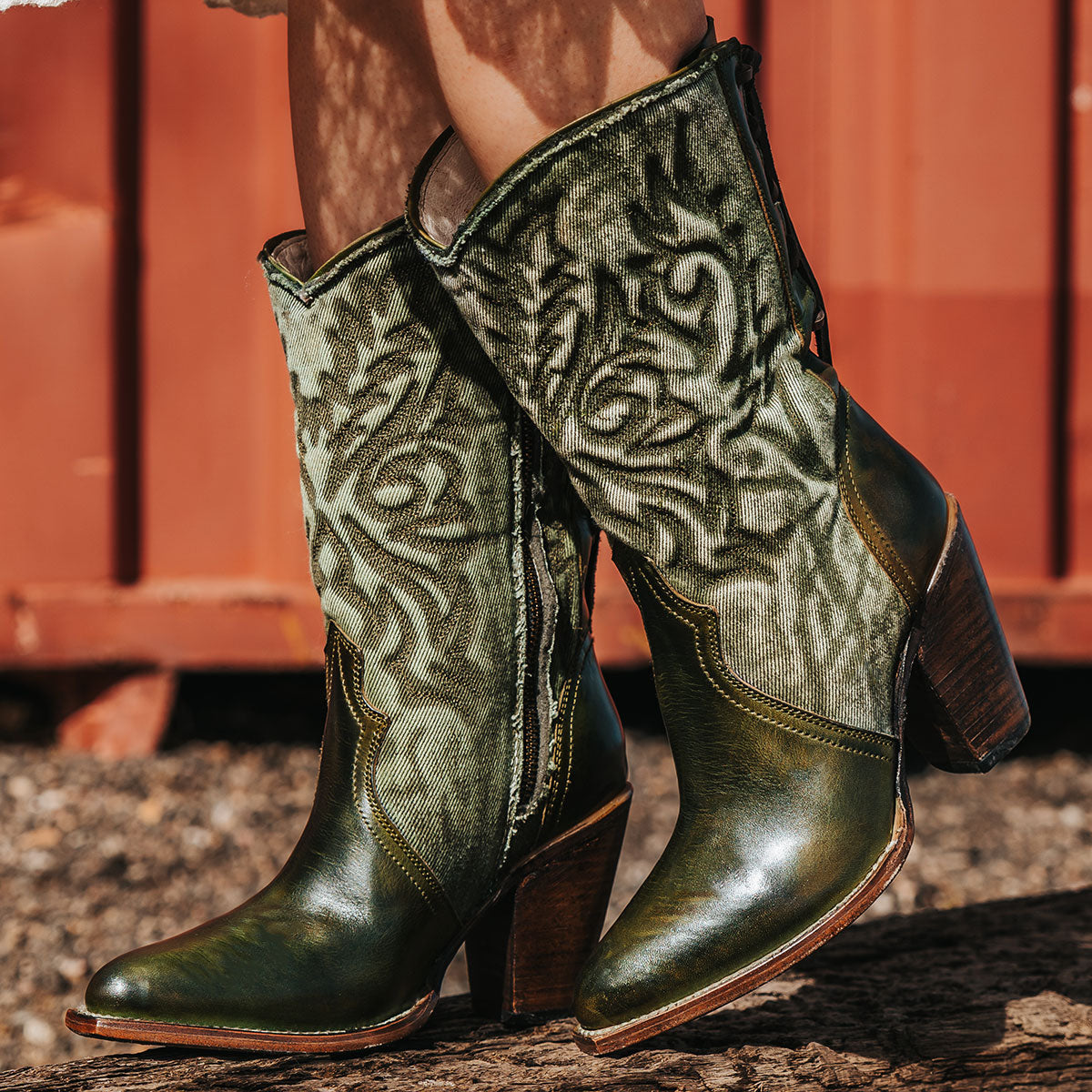 FREEBIRD women's Magnolia green denim and leather boot with mono shaft stitching, back panel lacing and a curved pointed toe silhouette 