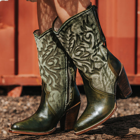 FREEBIRD women's Magnolia green denim and leather boot with mono shaft stitching, back panel lacing and a curved pointed toe silhouette 