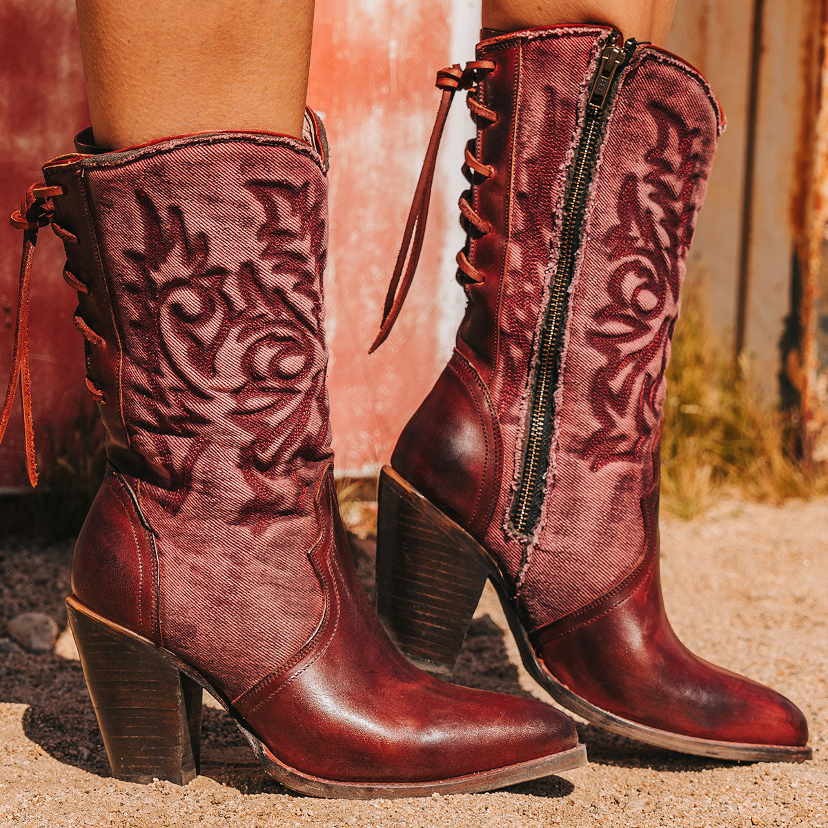 FREEBIRD women's Magnolia red denim and leather boot with mono shaft stitching, back panel lacing and a curved pointed toe silhouette