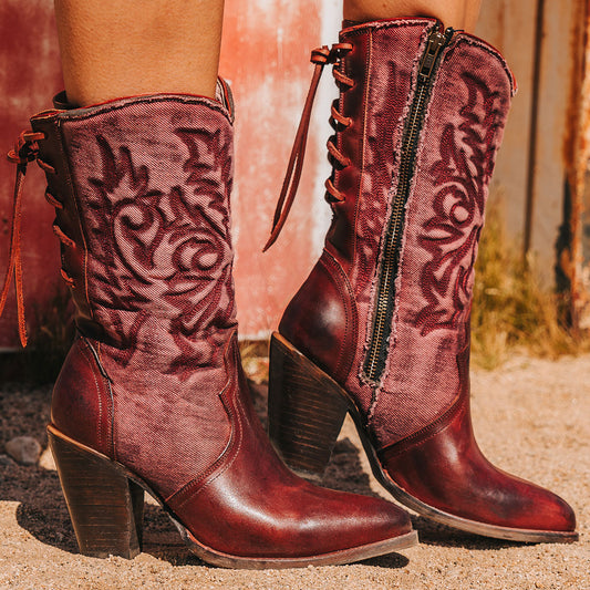 FREEBIRD women's Magnolia red denim and leather boot with mono shaft stitching, back panel lacing and a curved pointed toe silhouette