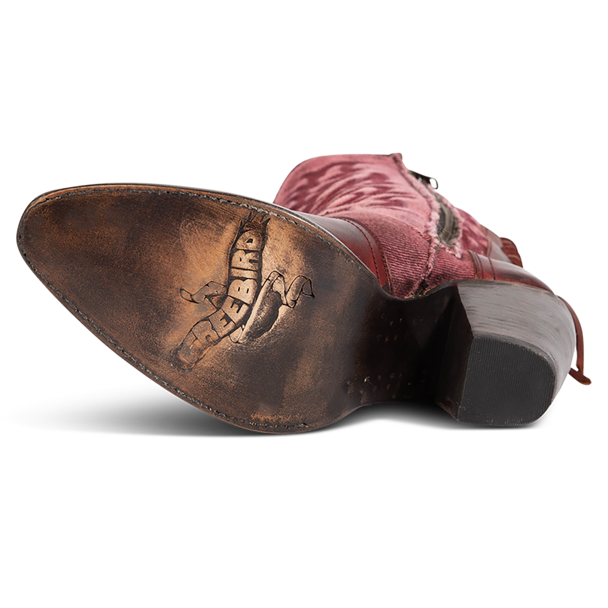 Leather sole imprinted with FREEBIRD on women's Magnolia red denim and leather boot