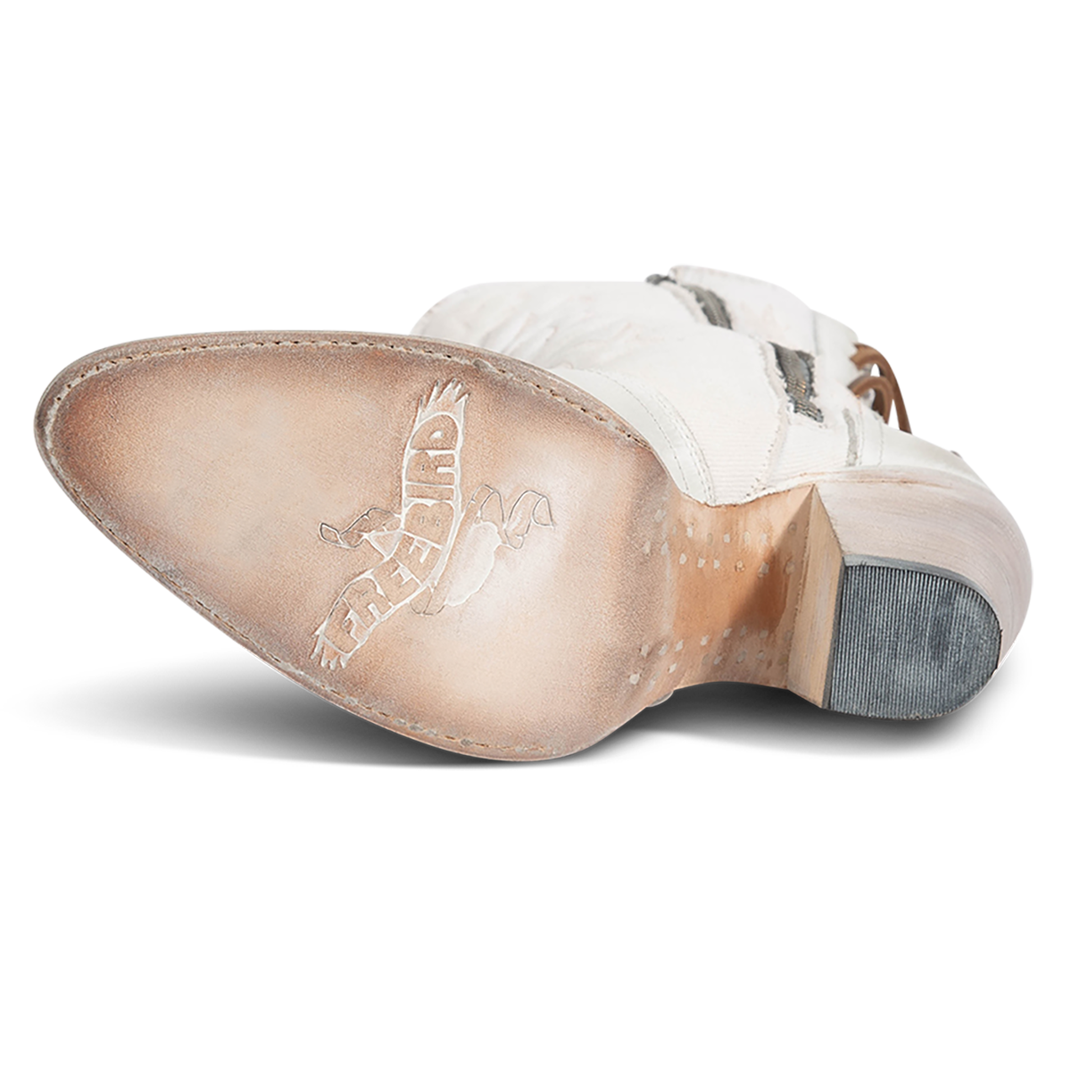 Leather sole imprinted with FREEBIRD on women's Magnolia white denim and leather boot