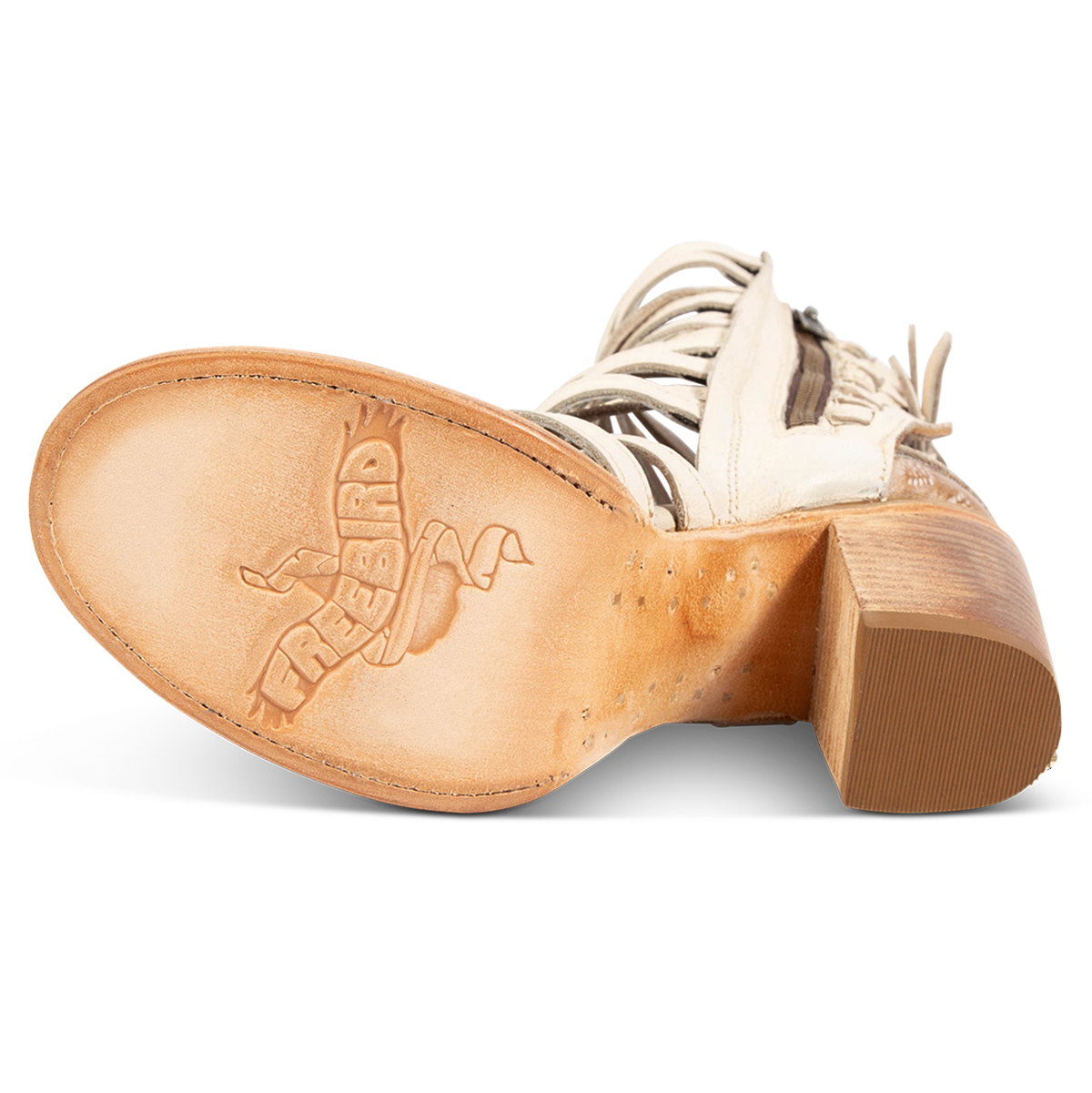 Leather sole imprinted with FREEBIRD on women's Makayla beige leather sandal 