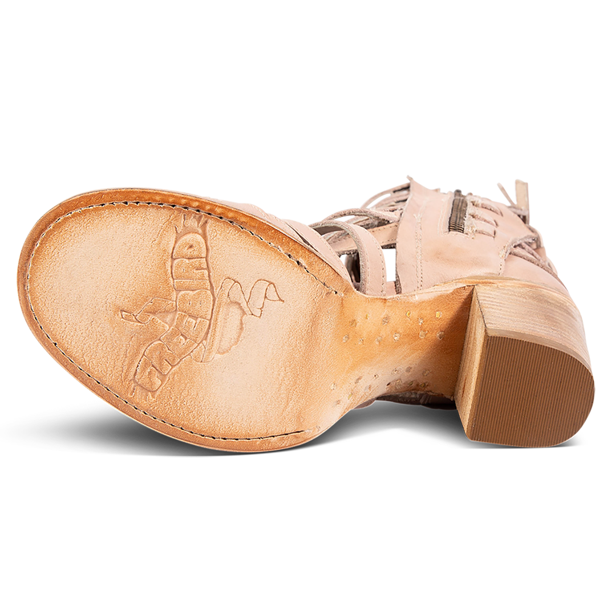 Leather sole imprinted with FREEBIRD on women's Makayla blush leather sandal