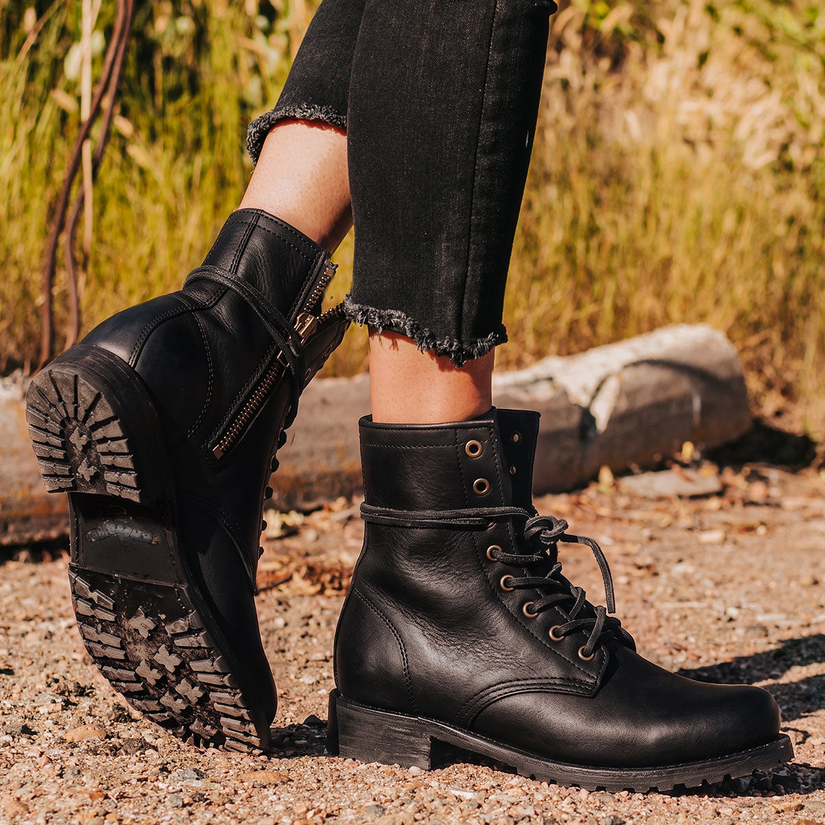Freebird women's MANCHESTER black leather combat bootie with an inside brass zipper, low heel & tread sole