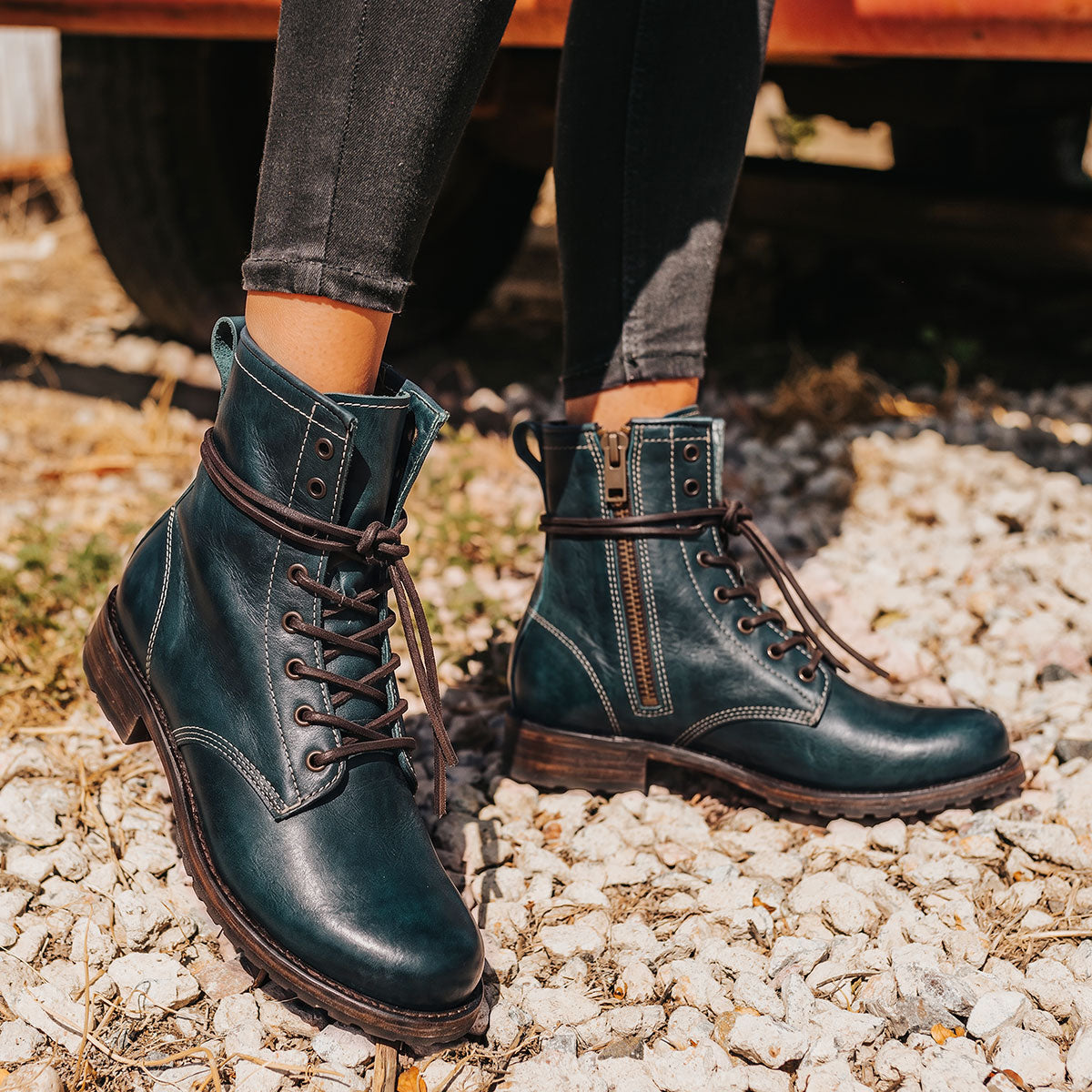 Freebird women's MANCHESTER blue multi leather combat bootie with an inside brass zipper, low heel & tread sole
